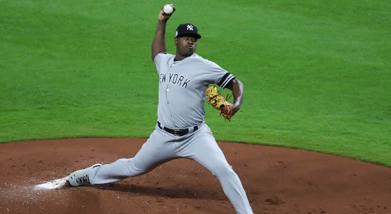 Oct 3, 2018; Bronx, NY, USA; New York Yankees starting pitcher Luis Severino (40) celebrates after making the last out while bases were loaded during the fourth inning against the Oakland Athletics in the 2018 American League wild card playoff baseball ga