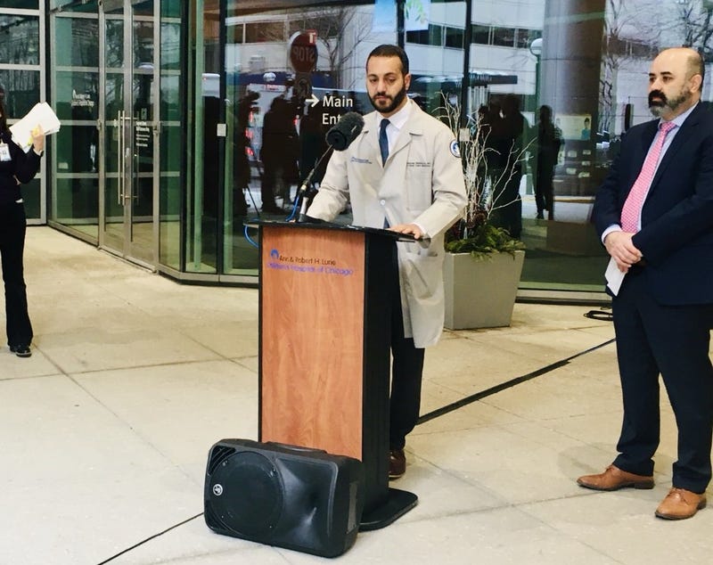 news conference in front of hospital