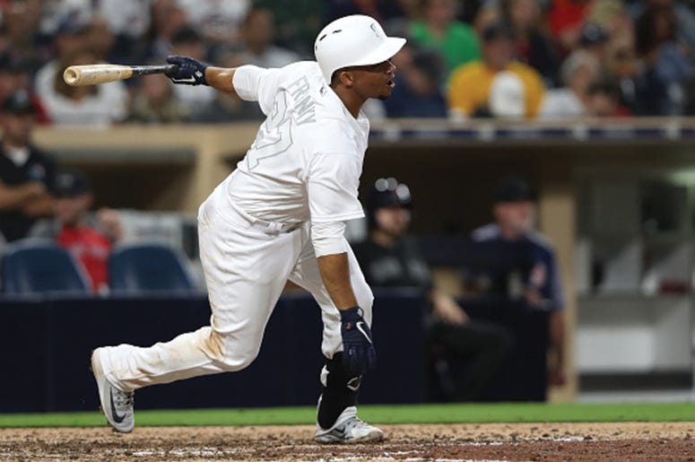 SAN DIEGO, CALIFORNIA - AUGUST 23: Francisco Mejia #27 of the San Diego Padres at bat during a game against the Boston Red Sox at PETCO Park on August 23, 2019 in San Diego, California. Teams are wearing special color schemed uniforms with players choosin