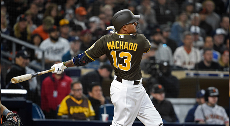 SAN DIEGO, CA - MARCH 29: Manny Machado #13 of the San Diego Padres hits a single during the fifth inning against the San Francisco Giants at Petco Park March 29, 2019 in San Diego, California. (Photo by Denis Poroy/Getty Images)