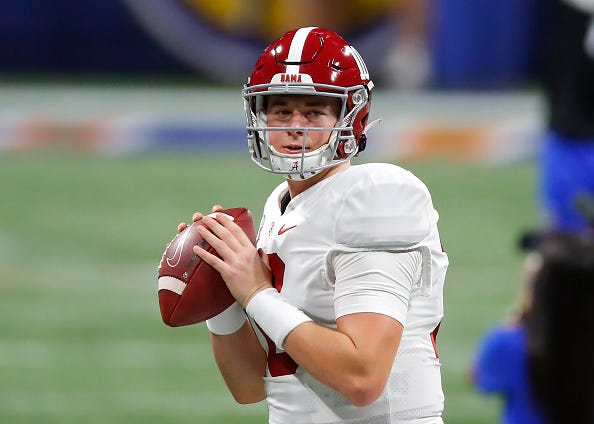 Mac Jones warms up for Alabama. 