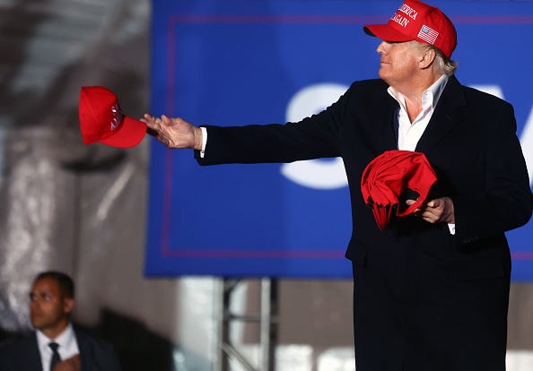 MAGA hat on Donald Trump