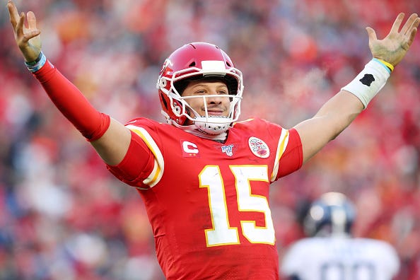Chiefs QB Patrick Mahomes celebrates a TD pass. 