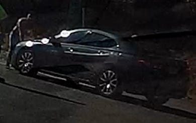 Image of Man and Sedan