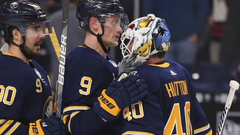 Marcus Johansson, Jack Eichel and Carter Hutton