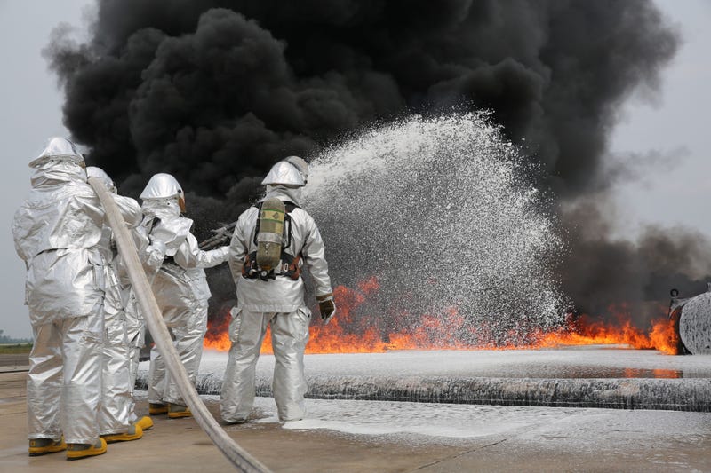 Marines with Bulk Fuel Company, 8th Engineer Support Battalion, 2nd Marine Logistics Group use Twin Agent Units to extinguish a blaze during a live fire training exercise aboard Marine Corps Air Station Cherry Point, Aug. 28, 2013. TAUs combine dry chemic