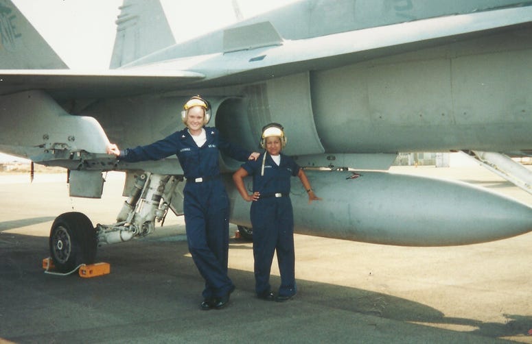 Jennifer Marshall (left) on board USS Theodore Roosevelt