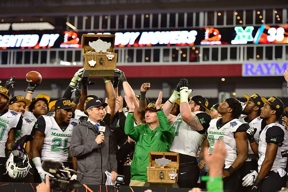 Marshall celebrates winning the 2018 Gasparilla Bowl. 