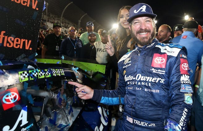 Mqrtin Truex Jr In Victory Lane After Winning NASCAR Cup Series Playoff Race At Martinsville Speedway