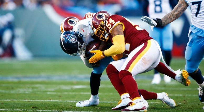 Redskins LB Mason Foster tackles Titans WR Corey Davis