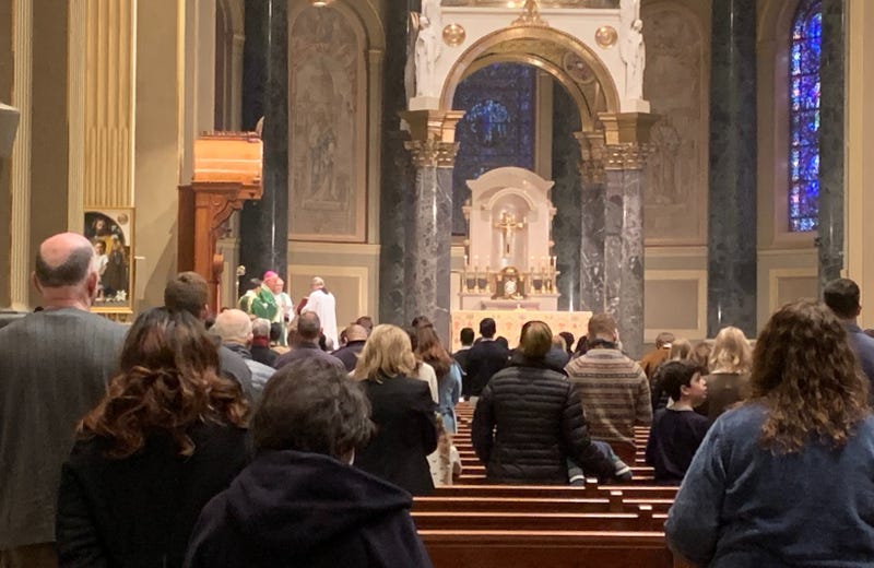 Parishioners pray for peace at a Mass for Ukraine Sunday morning at the Cathedral Basilica of Saints Peter and Paul in Center City.