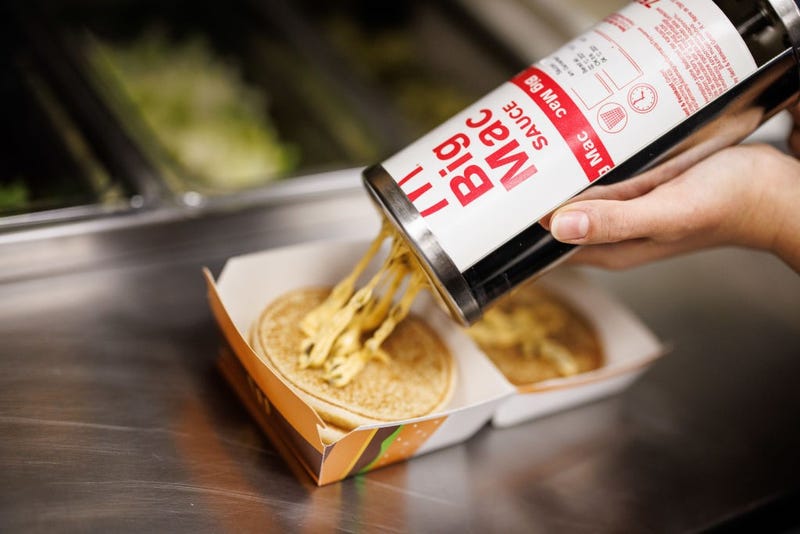 Sauce being applied to Big Mac
