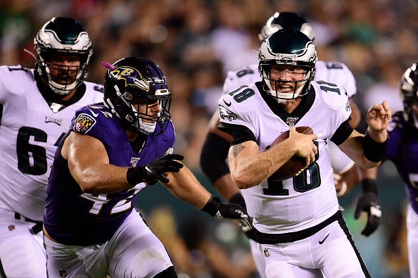 Josh McCown scrambles in a game against the Ravens. 
