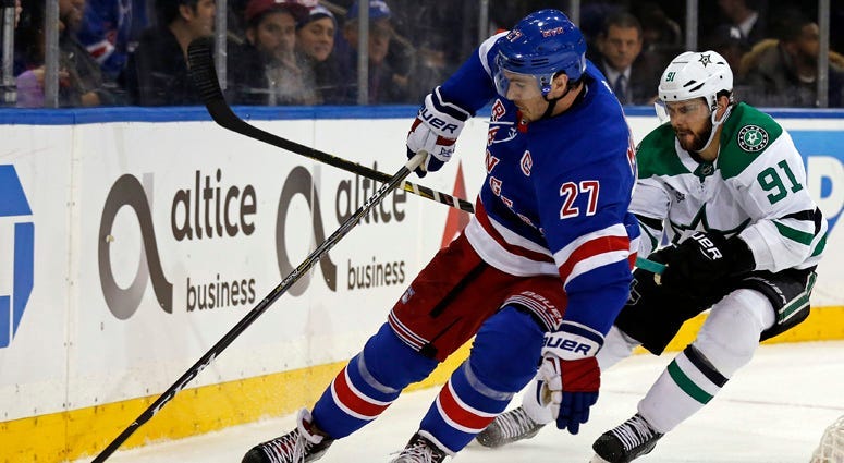 Rangers defenseman Ryan McDonagh controls the puck in front of Dallas Stars center Tyler Seguin on Dec. 11, 2017, at Madison Square Garden.