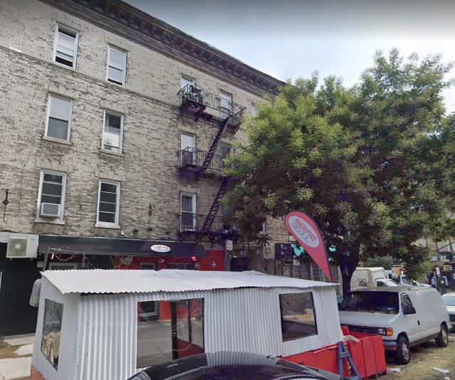 The building where the 9=year-old girl's body was discovered on Sunday.