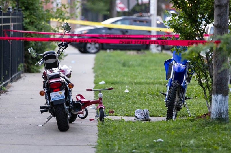 A crime scene taped off where a 2-year-old boy and a 32-year-old man were critically wounded in a shooting on the 1500 block of North Tripp Avenue in West Humboldt Park, Tuesday, July 13, 2021.