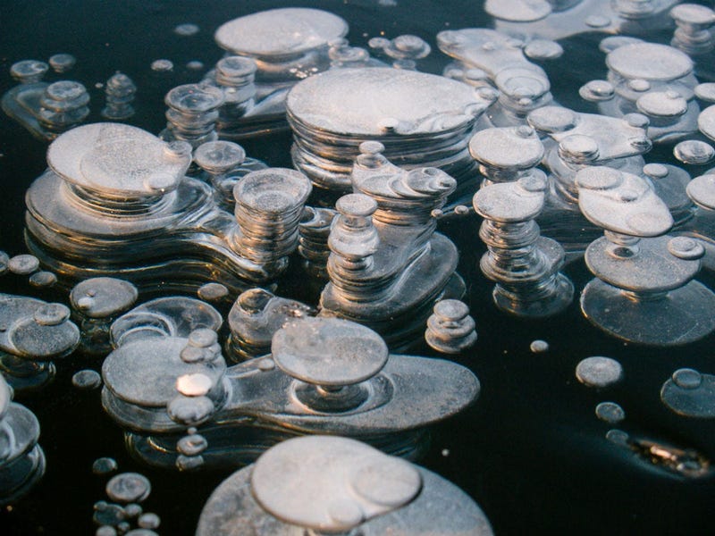 Methane bubble in the ice a of a freshly frozen Paezeriai lake in Lithuania