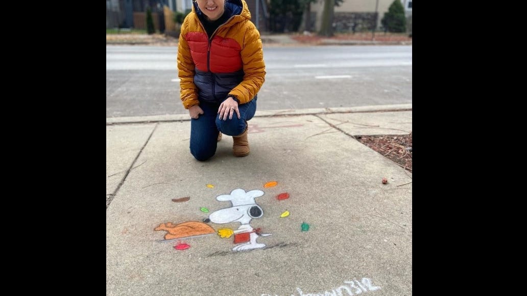 North Side woman spreading joy, one chalk drawing at a time