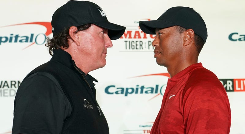 November 20, 2018; Las Vegas, NV, USA; Phil Mickelson (left) and Tiger Woods (right) pose for a photo during a press conference before The Match: Tiger vs Phil golf match at Shadow Creek Golf Course. Mandatory Credit: Kyle Terada-USA TODAY Sports