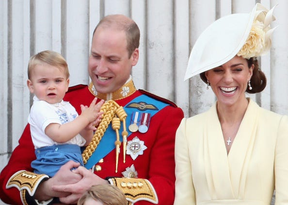 Prince William and Kate Middleton with their son, Prince Louis. 