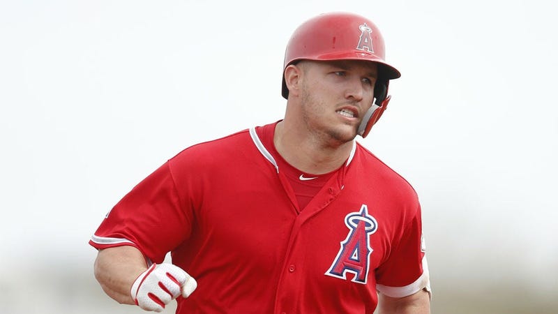 Los Angeles Angels center fielder Mike Trout (27) runs to third base after hitting a triple against the Los Angeles Dodgers in the first inning at Tempe Diablo Stadium. 