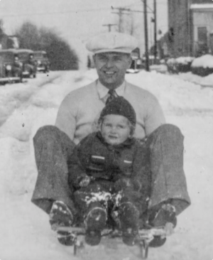 Mildred Oberkotter as a young child with her father Paul