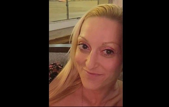Undated photo of 33-year-old Mollie Schmidt, mother of 5, who was found slain in an apartment on the state's west side