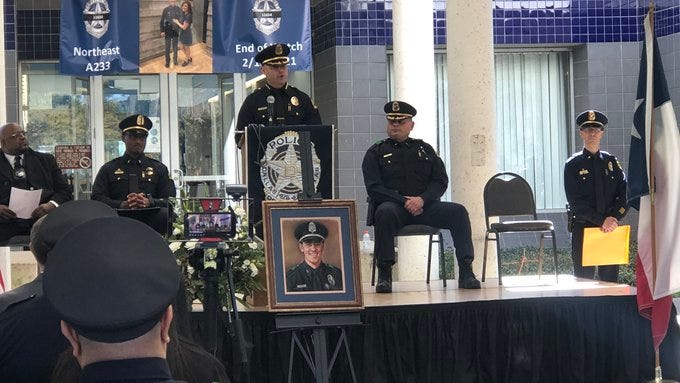 Dallas Police unveil memorial to officer killed last year