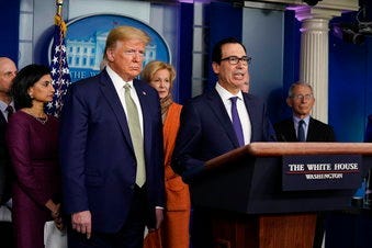 Treasury Secretary Steven Mnuchin speaks during a press briefing with the coronavirus task force, at the White House, Tuesday, March 17, 2020, in Washington, as President Trump looks on. (AP Photo/Evan Vucci)
