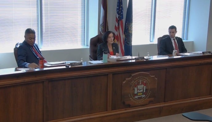 Montgomery County Commissioners (l to r) Ken Lawrence, Val Arkoosh and Joe Gale preside over a budget hearing Thursday, Dec. 1 in Norristown.