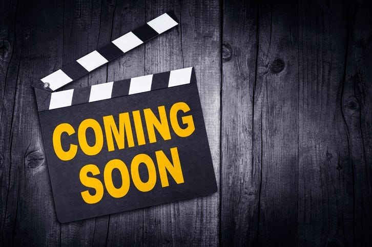 Movie sign advertising "coming soon"