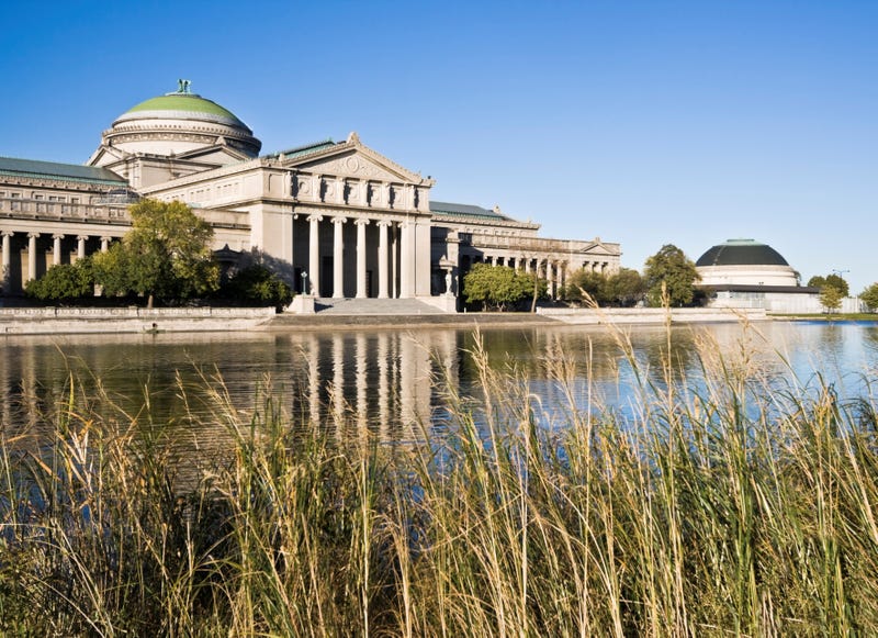 Museum of Science and Industry exterior, with water surrounding it