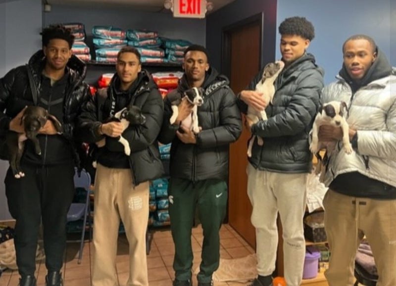 The Capital Area Humane Society in Lansing had a special visit on Wednesday evening after members of the Michigan State men's basketball team stopped by to greet a litter of puppies named after them.