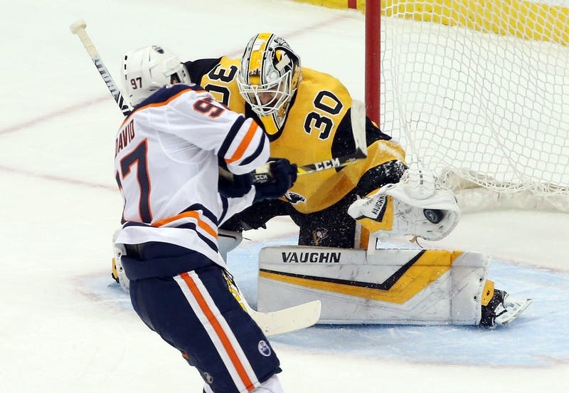 Pittsburgh Penguins goaltender Matt Murray (30) makes a save on a penalty shot by Edmonton Oilers center Connor McDavid (97) during the second period at PPG PAINTS Arena.