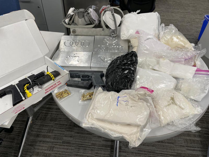 Narcotics and weapons seized