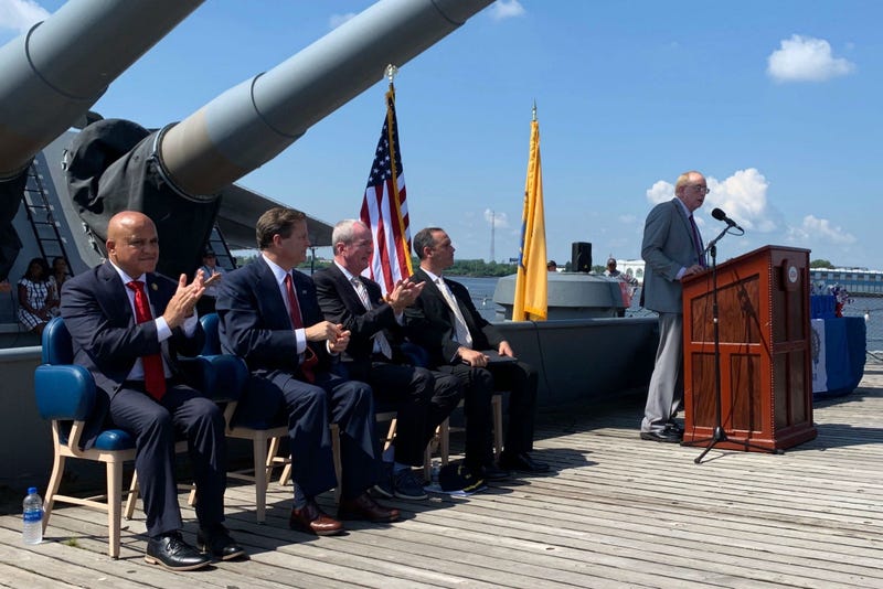 New Jersey Congressman Donald Norcross (second from left) and N.J. Gov. Phil Murphy (second from right) spoke at a Fourth of July naturalization ceremony on the Battleship New Jersey.