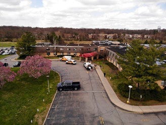 Ambulance crews are parked outside Andover Subacute and Rehabilitation Center in Andover, N.J., on Thursday April 16, 2020. (AP Photo/Ted Shaffrey) 