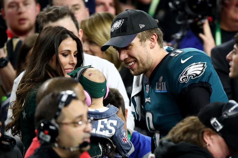 Nick Foles with child and wife