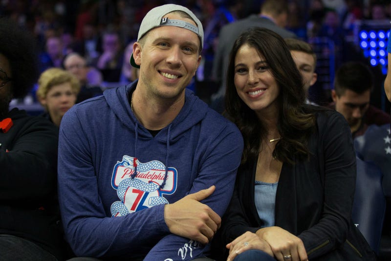 Philadelphia Eagles quarterback Nick Foles and his wife Tori Moore Foles look on during the third quarter in game three of the second round of the 2018 NBA Playoffs between the Philadelphia 76ers and the Boston Celtics at Wells Fargo Center.