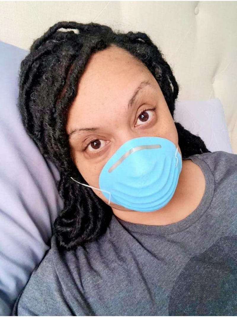 Ga State Senator Nikema Williams wears a mask as she has self-quarantined following exposure to the coronavirus
