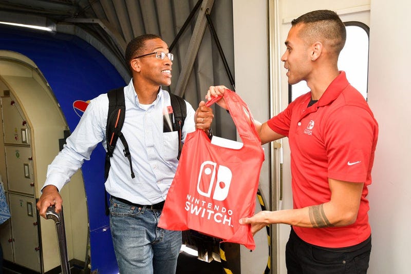Guy getting a free Nintendo Switch