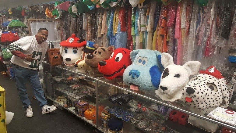 Derek Lee at his store, D&J Costumes