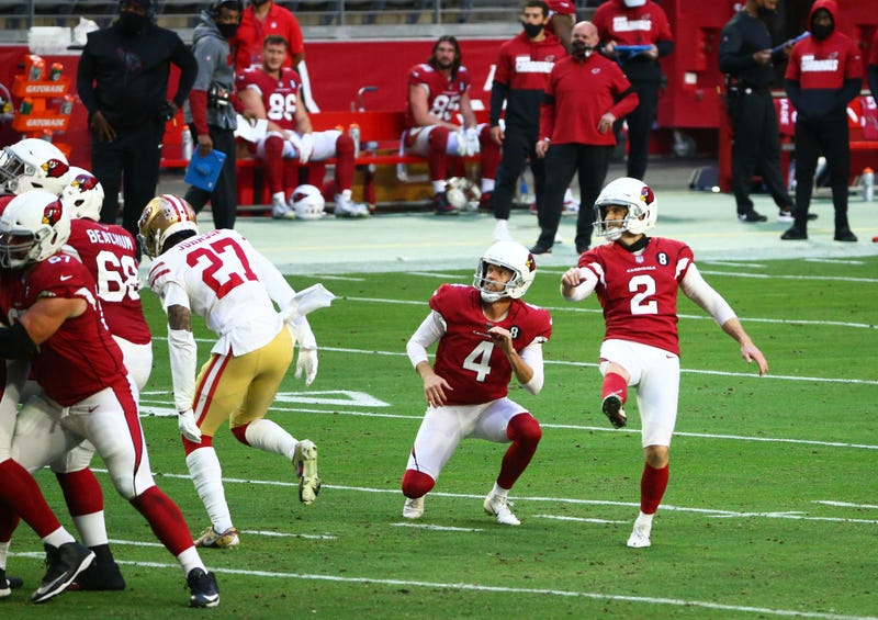 Mike Nugent attempts a field goal for the Cardinals. 