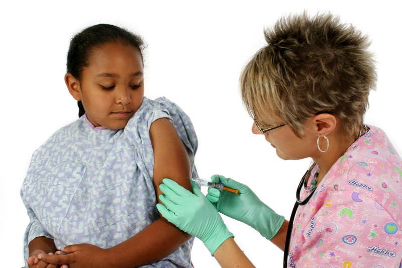 Nurse performing injection