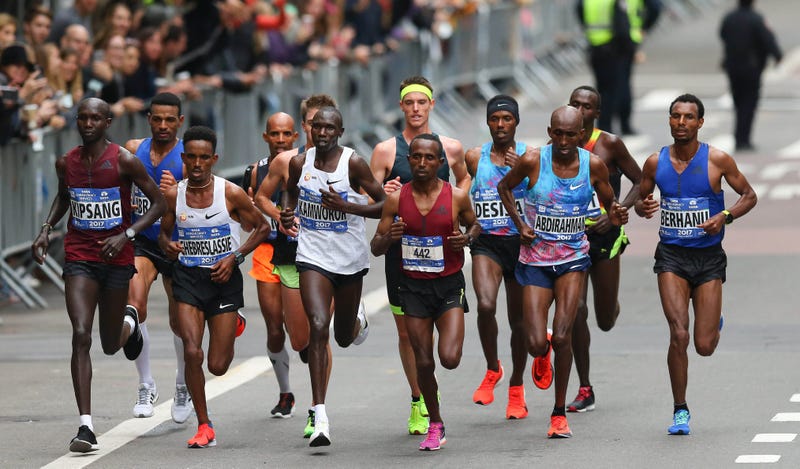 Nov 5, 2017; New York, NY, USA; Runners in the elite men division led by Ghirmay Ghebreslassie and Geoffrey Kamworor during the professional men's division at the 2017 TCS New York City Marathon. Mandatory Credit: Vincent Carchietta-USA TODAY Sports