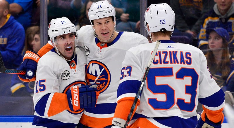 Jan 5, 2019; New York Islanders left wing Matt Martin (17) is congratulated by right wing Cal Clutterbuck (15) and center Casey Cizikas (53) after scoring during the second period. Jeff Curry-USA TODAY Sports