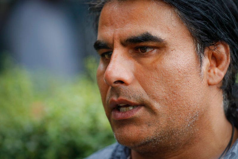 Abdul Aziz, survivor of mosque shooting speaks to Associated Press during an interview in Christchurch, New Zealand, Saturday, March 16, 2019.