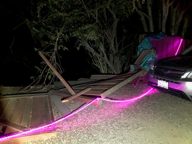 A fence knocked down by strong winds in Oakland
