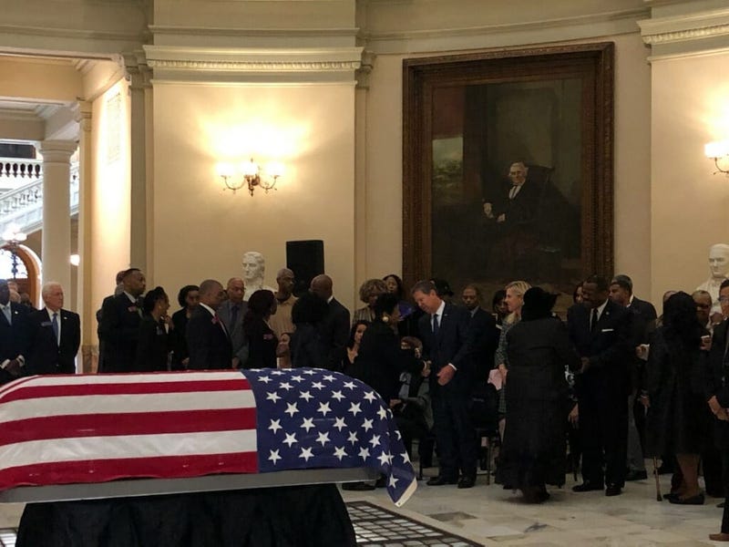 The flag draped coffin of former GA State Senator Leroy Johnson sits inside the Capitol rotunda