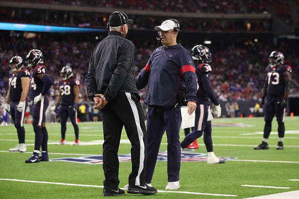 Texans coach Bill O'Brien argues the call on the field. 